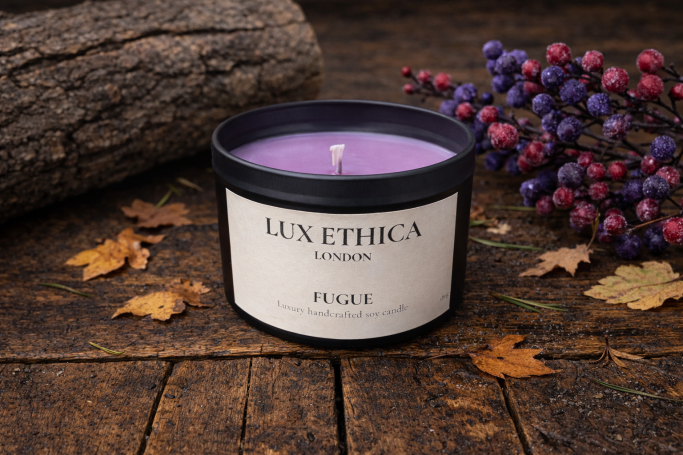 Fugue Purple candle with autumnal leaves and berries